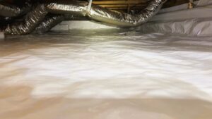 Encapsulated crawl space with vapor barrier, insulation, and dehumidifier, professional Crawl Space Mold Prevention Gainesville GA by Pure Protection Restorations.
