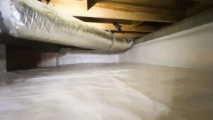 Encapsulated crawl space with vapor barrier, insulation, and dehumidifier, professional Crawl Space Mold Prevention Gainesville GA by Pure Protection Restorations.